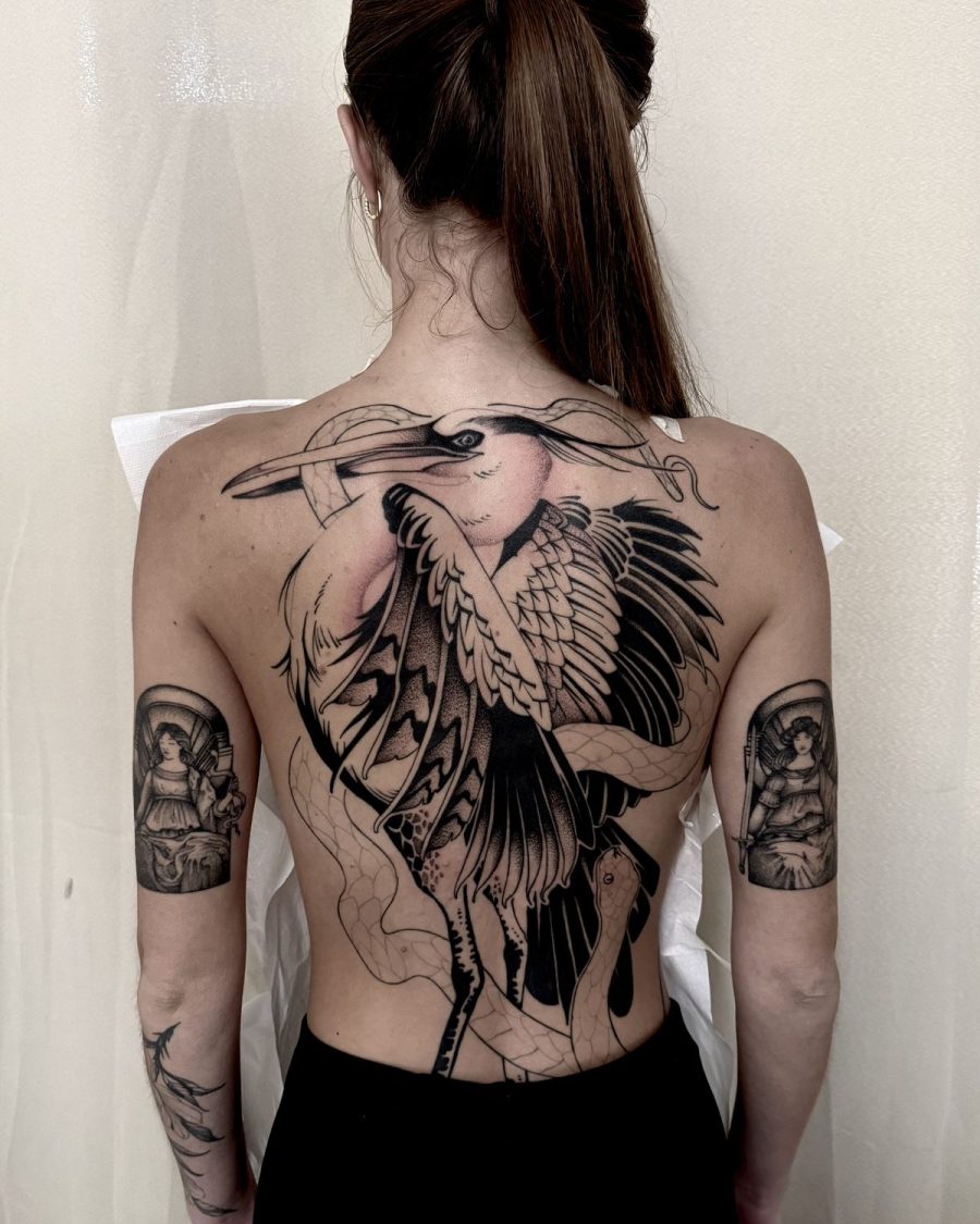 Héron et serpent — Milos Premier, blackwork, OKO Tattoo Genève